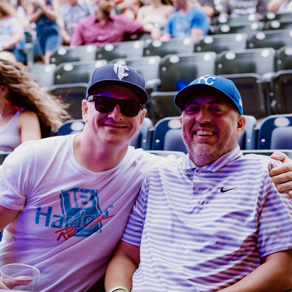 Two men sitting in the seats at Starlight.