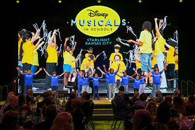 Children from local schools that participate in Disney's Musicals in Schools program perform a song during the Starlight Gala.