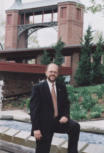 Bob Rohlf standing in front of the fountain at Starlight