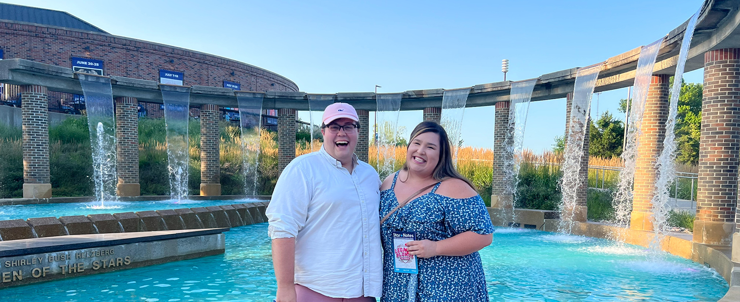 Denton Williams and a woman standing in front of Starlight fountain