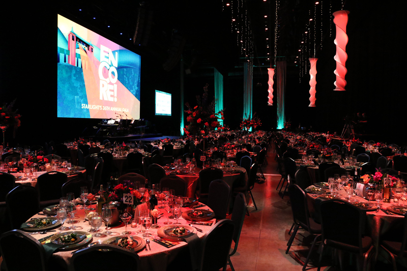 The stage set with tables and flowers