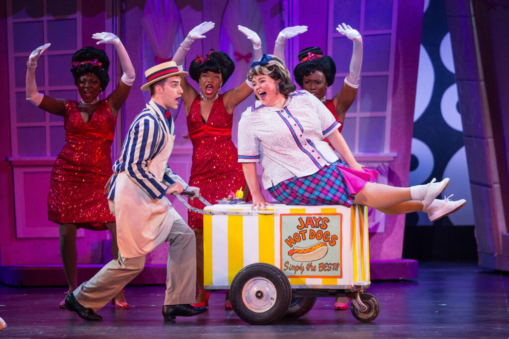 Cast of Hairspray performing on stage
