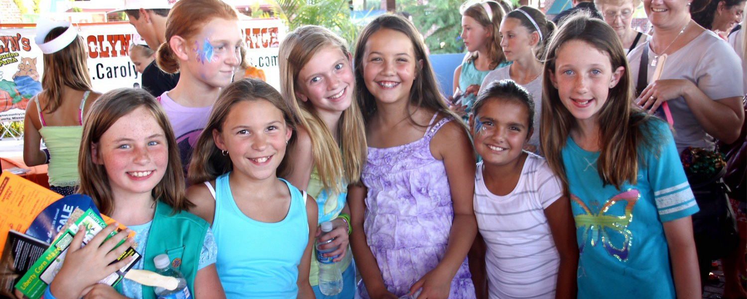 Group of Girl Scouts smiling at the camera