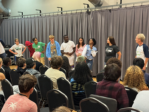 Students participate in an improv activity