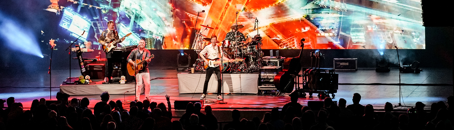 Musicians playing during a concert at Starlight